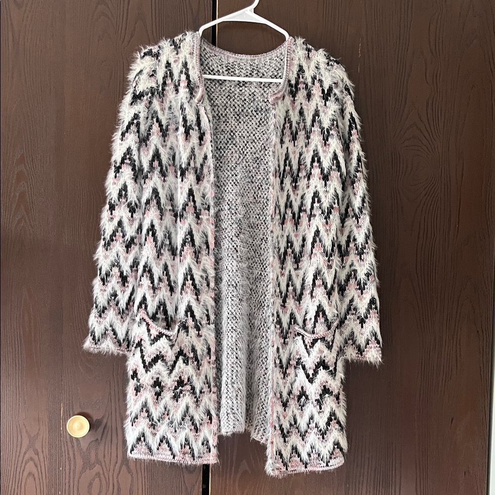 Absolutely Famous long sleeved white, black and pink long sweater. Size Medium.